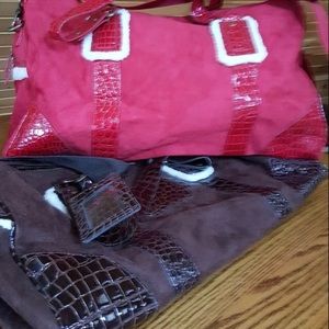 Bundle of Victoria’s Secret weekender bags.